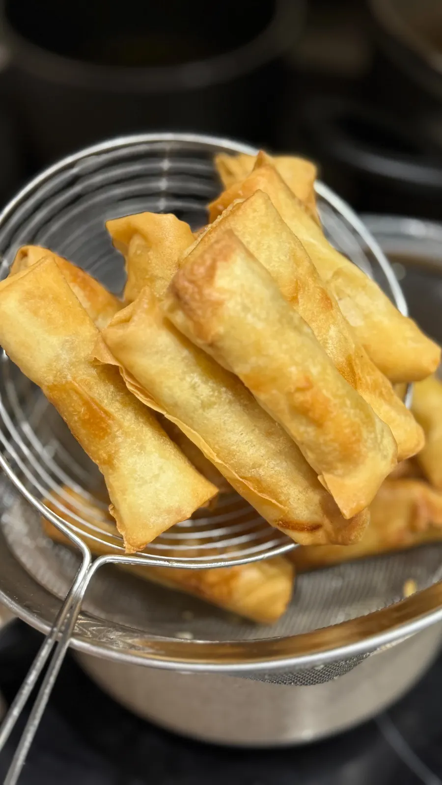 Crispy spring rolls fresh from the fryer